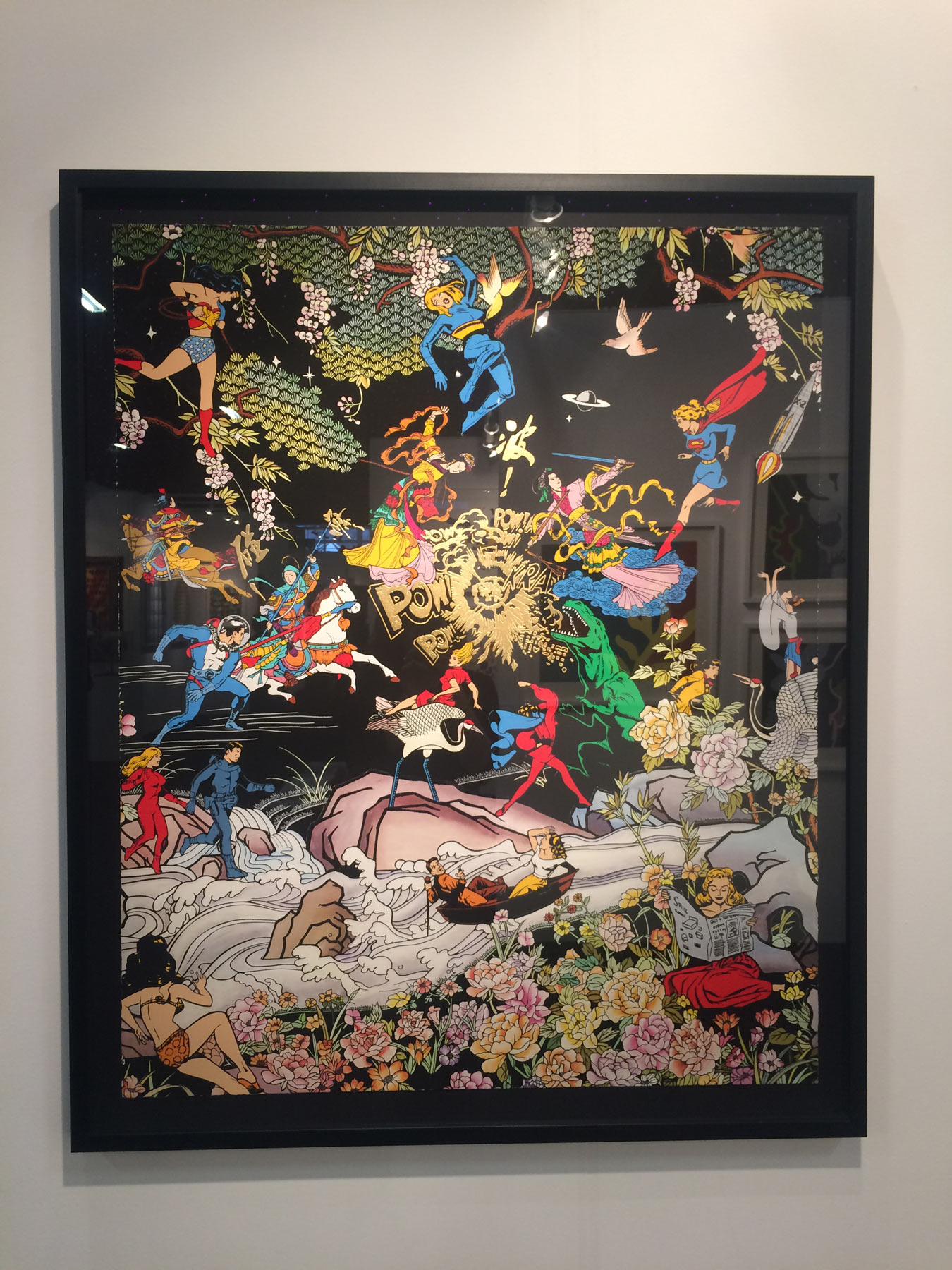 A vibrant pop-art print custom framed in a black moulding at Westside Frame Shop